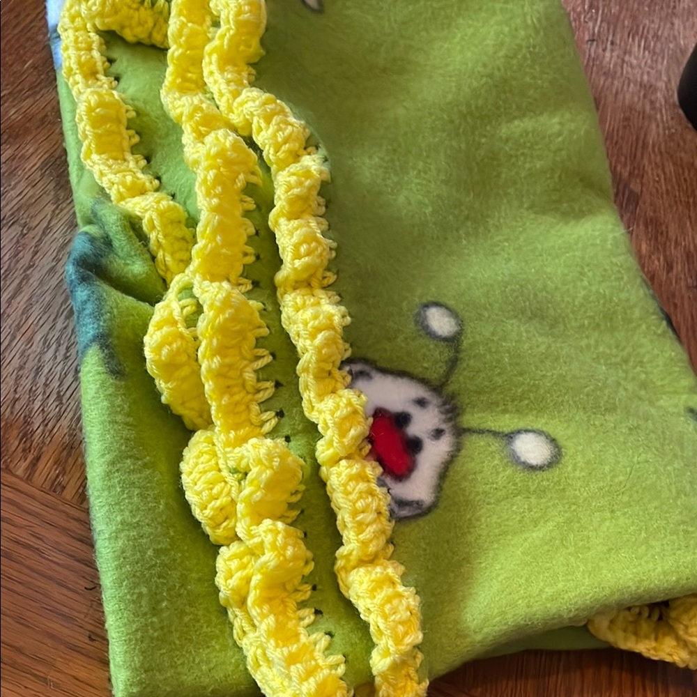 Green Blanket with Yellow Trim